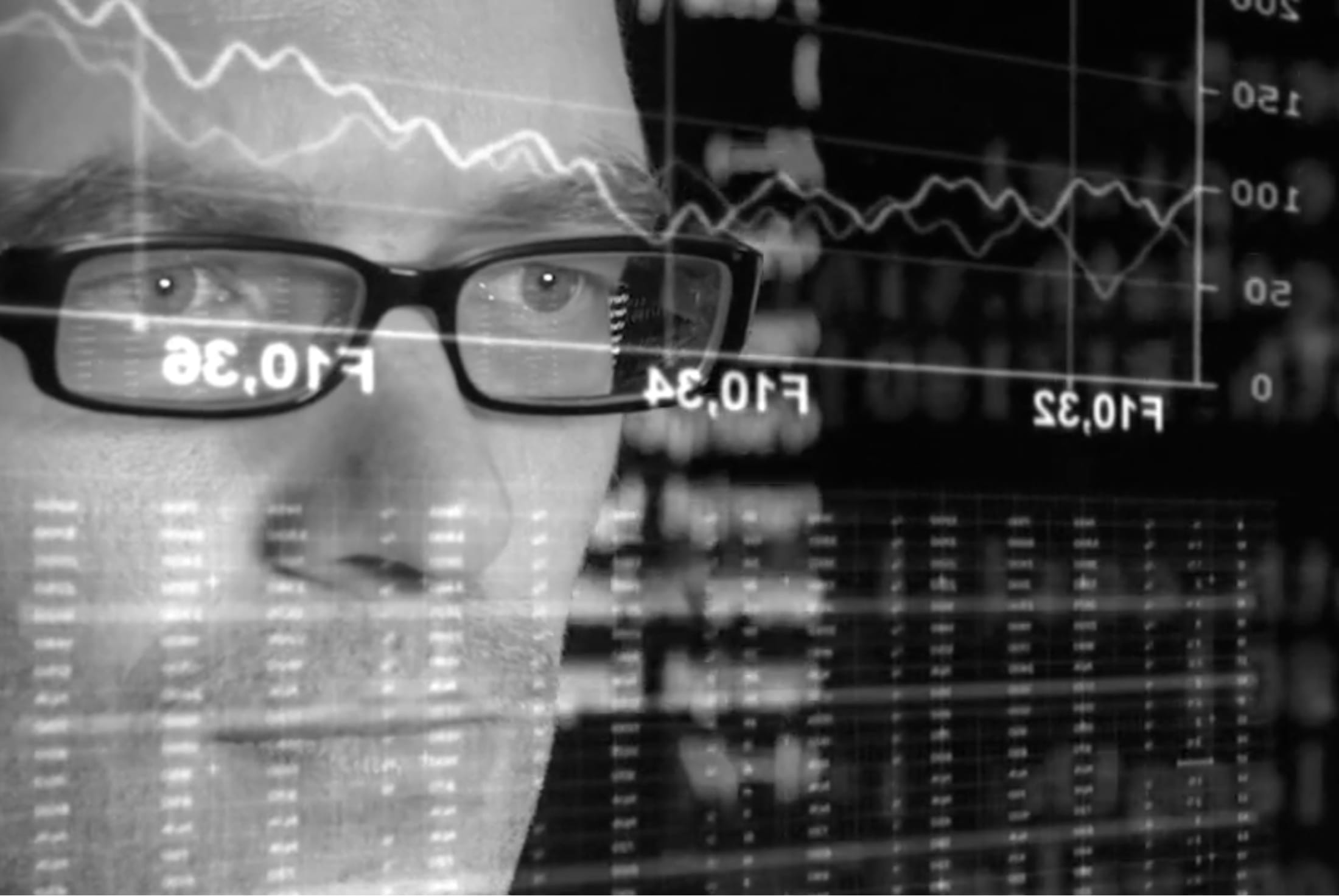 photo of a man with statistics and code overlayed on his face